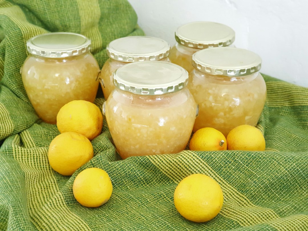 Clear glass jar with white liquid inside