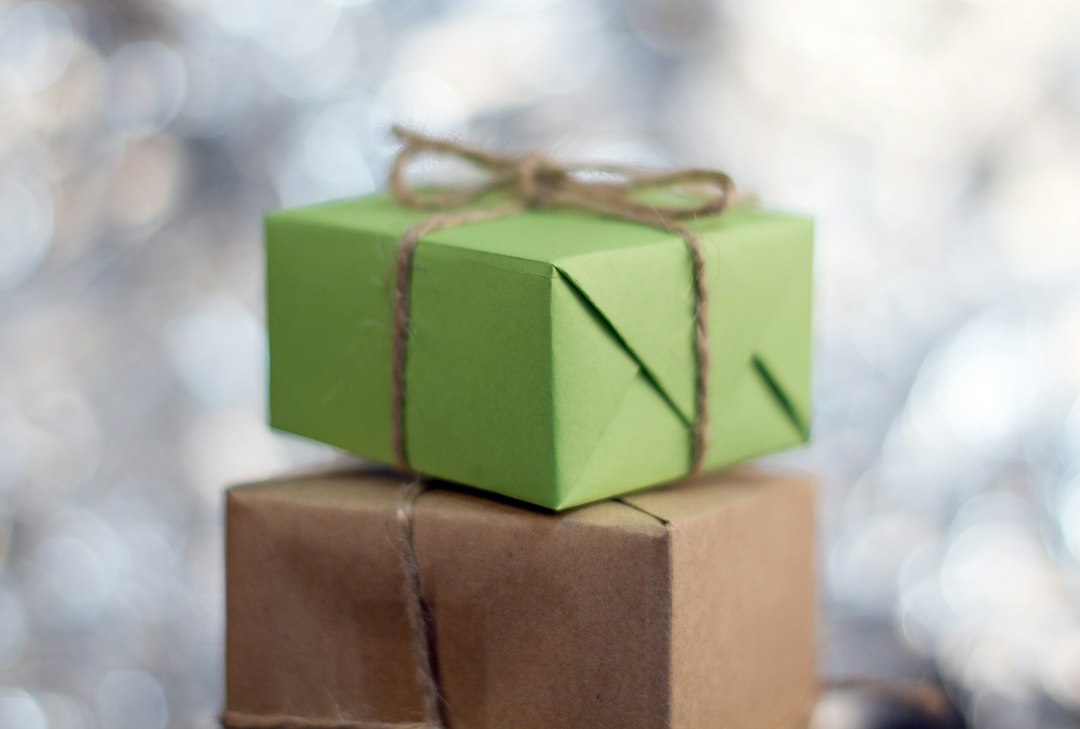 Two wrapped presents sitting on top of each other