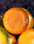 Gill Orange Soap – Gill Orange Soap close-up with fresh oranges – Old California Botanicals
